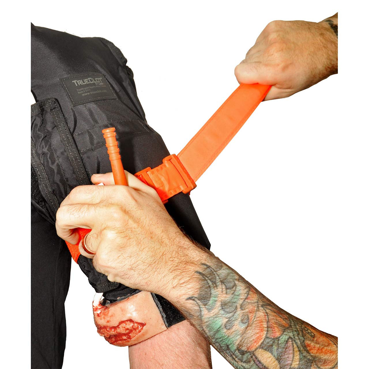 Tourniquet training in use on arm with CAT tourniquet