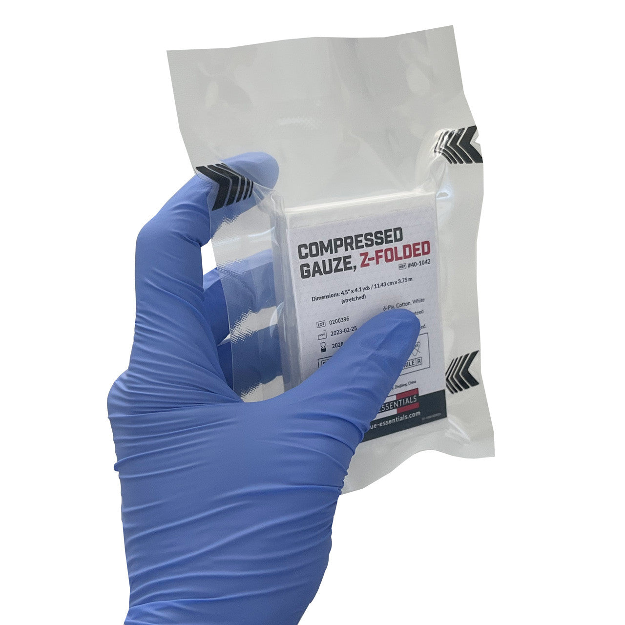 Rescue Essentials® Compressed Gauze, Z-folded- Package in hand side angle