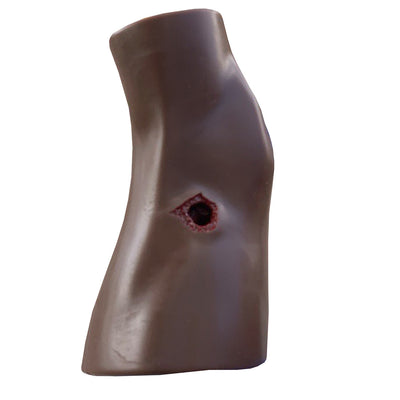Dark Tone PCT3 Leg Trainer by TrueClot with gauze stuffed in gun shot wound