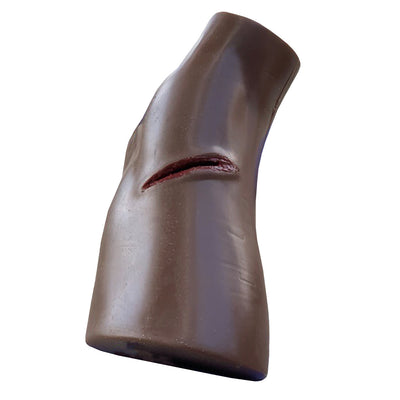 Dark Tone PCT3 Leg Trainer by TrueClot with gauze stuffed in knife wound