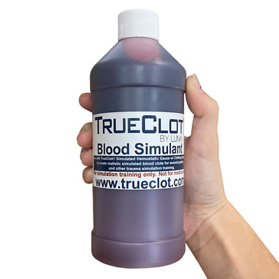 Blood Simulant, Pre-Mixed by TrueClot bottle in hand