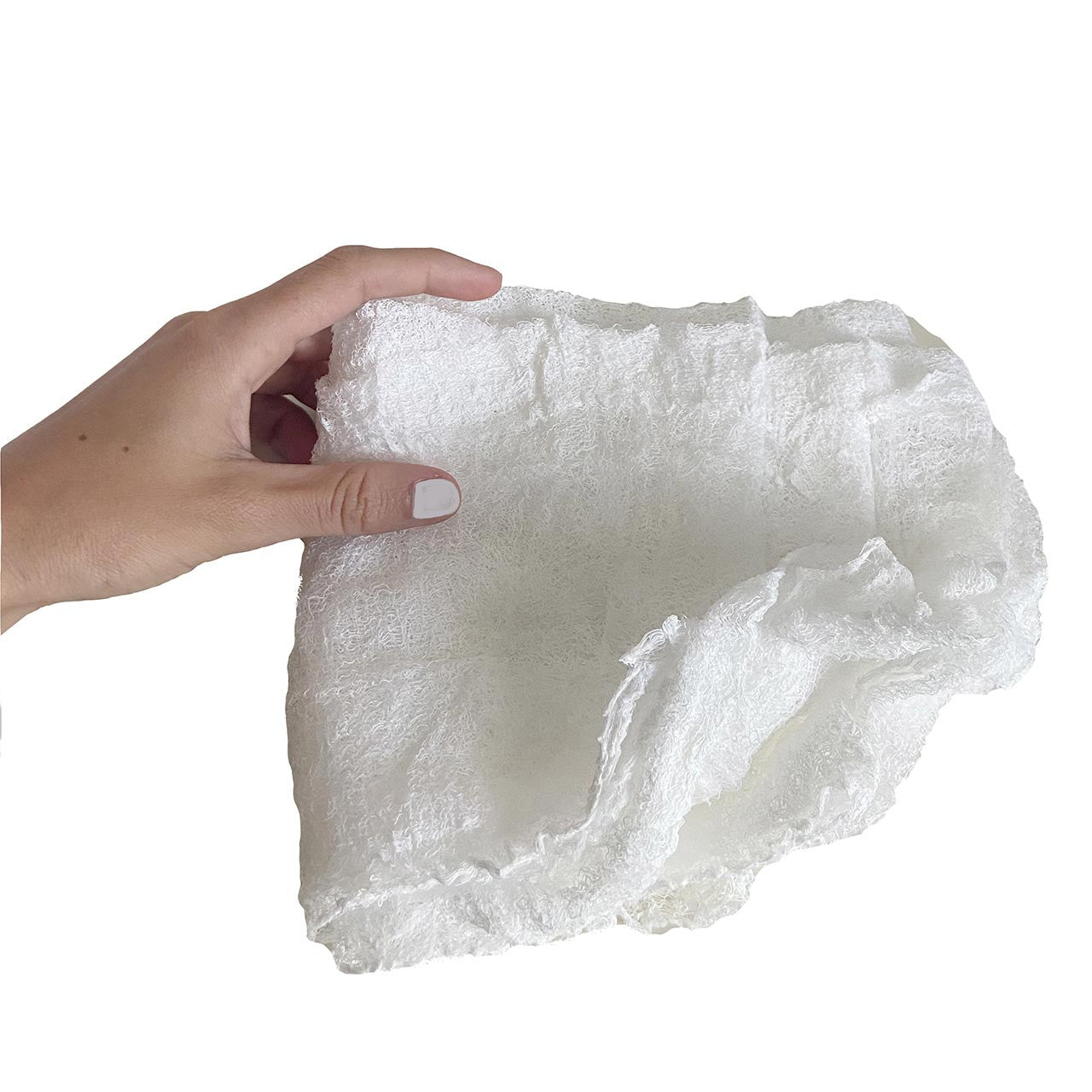 Hand holding loose gauze